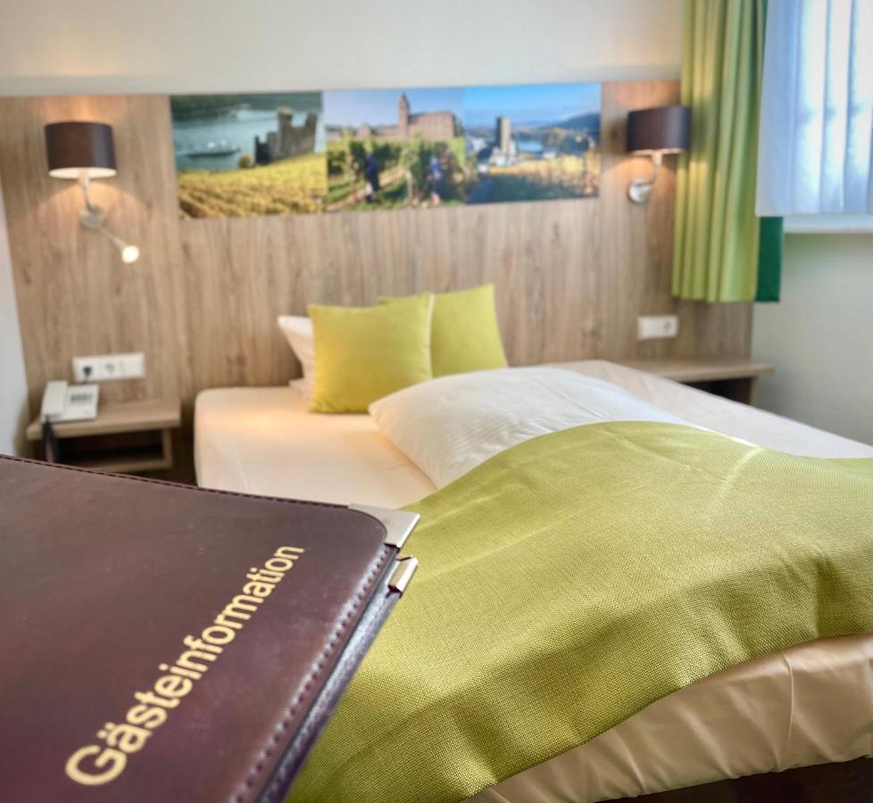 Altdeutsche Weinstube Hotel ฮูเดสไฮม์ แอม ไฮน์ ภายนอก รูปภาพ